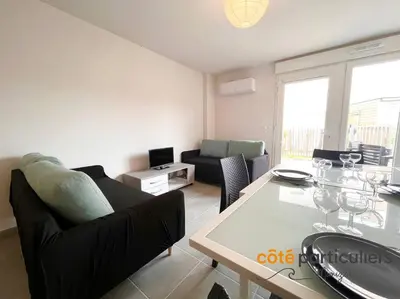 Coin salon dans l'établissement Au Soleil Couchant - Apt T3 à 800m de l'Océan