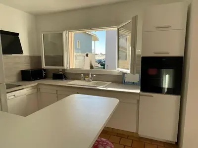 Cuisine ou kitchenette dans l'établissement La villa des mouettes