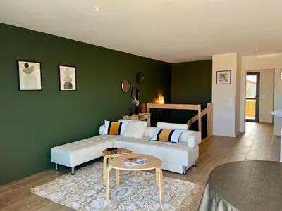 Coin salon dans l'établissement Vue Océan - Au Coeur de Contis Plage
