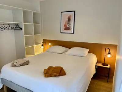 Un ou plusieurs lits dans un hébergement de l'établissement Vue Océan - Au Coeur de Contis Plage