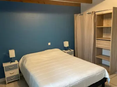 Un ou plusieurs lits dans un hébergement de l'établissement Gîte Bassin d'Arcachon, piscine couverte chauffée