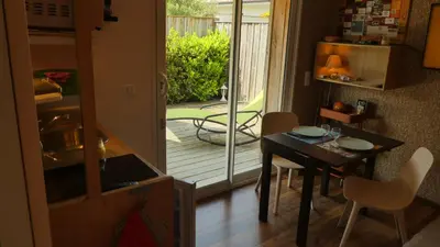 Coin salon dans l'établissement T2 au calme avec terrasse sur le bassin d'Arcachon