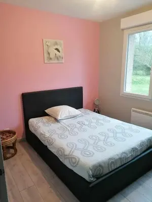 Un ou plusieurs lits dans un hébergement de l'établissement Maison de campagne