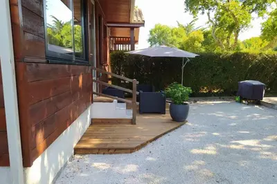 Jardin de l'établissement Agréable chalet à Gujan-Mestras