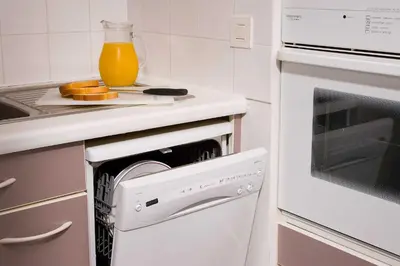 Cuisine ou kitchenette dans l'établissement Madame Vacances Les Appartements de Moliets