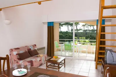 Balcon ou terrasse dans l'établissement Madame Vacances Les Appartements de Moliets