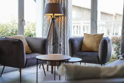 Coin salon dans l'établissement Appartement T2 idéal 2 personnes-150 m de la plage