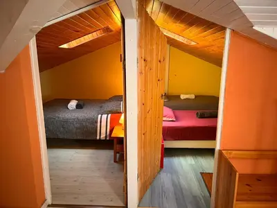 Un ou plusieurs lits dans un hébergement de l'établissement Maisonnette 3 chambres - Confort