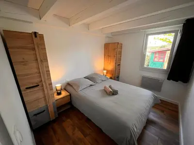 Un ou plusieurs lits dans un hébergement de l'établissement Maisonnette 3 chambres - Confort
