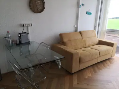 Coin salon dans l'établissement Appartement Biscarrosse plage front de mer 4 personnes