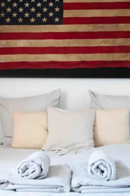Un ou plusieurs lits dans un hébergement de l'établissement Le Landifornia - Design cosy & horizon bleu avec vue océan