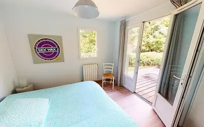 Un ou plusieurs lits dans un hébergement de l'établissement LYS DE NOJALS - Superbe villa familiale entre lac et mer avec jardin