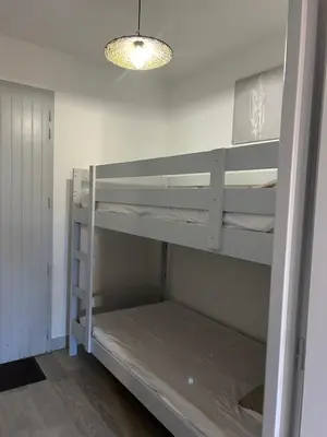 Un ou plusieurs lits dans un hébergement de l'établissement BISCAROSSE PLAGE STUDIO TERASSE BARBECUE À 150 m DE LA PLAGE