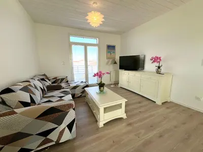 Télévision ou salle de divertissement dans l'établissement Ô COURANT - T3 terrasse vue océan