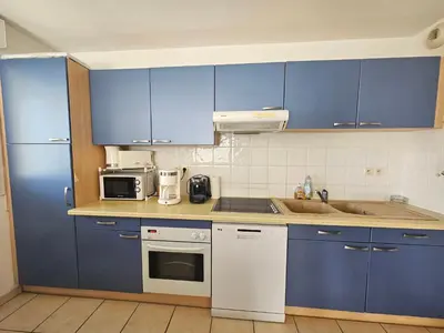 Cuisine ou kitchenette dans l'établissement Soustons - Piscine - Famille - Centre Ville