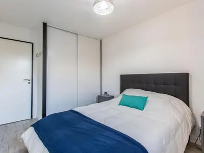 Un ou plusieurs lits dans un hébergement de l'établissement Apartment Clair de Dune-3 by Interhome