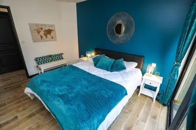 Un ou plusieurs lits dans un hébergement de l'établissement Appartement plage à pied