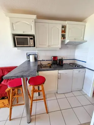 Cuisine ou kitchenette dans l'établissement Plage océan