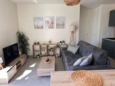 Télévision ou salle de divertissement dans l'établissement A 600m de la plage - Le Nature -
