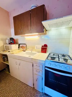 Cuisine ou kitchenette dans l'établissement Studio ouest à 300m des plages