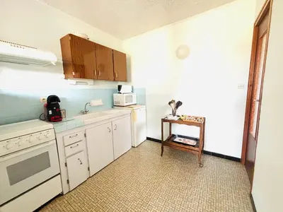 Cuisine ou kitchenette dans l'établissement Studio sud à 300m des plages