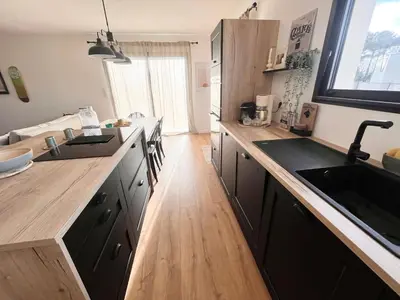 Cuisine ou kitchenette dans l'établissement Sunset House