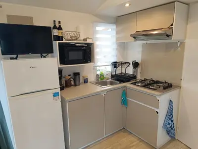 Cuisine ou kitchenette dans l'établissement Vacances dans les Landes