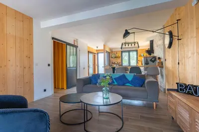 Coin salon dans l'établissement Comme Un Petit Chalet