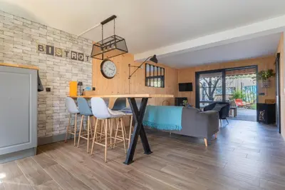 Coin salon dans l'établissement Comme Un Petit Chalet