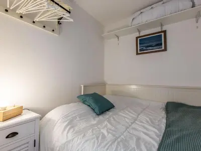 Un ou plusieurs lits dans un hébergement de l'établissement Apartment Maison de l'océan-7 by Interhome