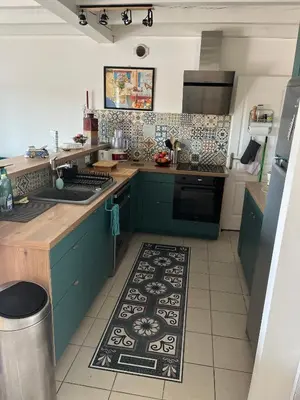 Cuisine ou kitchenette dans l'établissement LE DODO LĖ LA