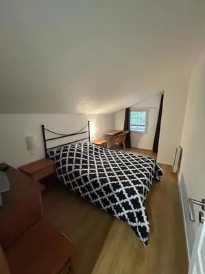 Un ou plusieurs lits dans un hébergement de l'établissement Charmante maison dans résidence avec piscine proche golf et plage