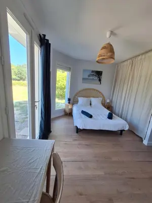 Un ou plusieurs lits dans un hébergement de l'établissement Le spot Landais - Chambre côté forêt