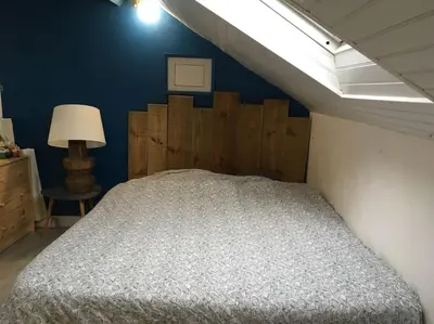 Un ou plusieurs lits dans un hébergement de l'établissement Appartement chez Loulou