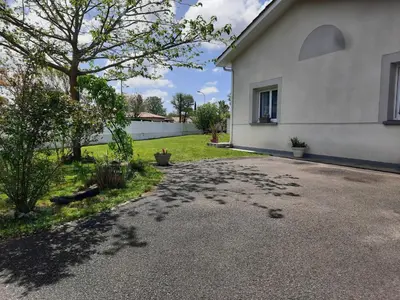 Jardin de l'établissement Chambre d'hôtes La Perla du Teich, piscine chauffée