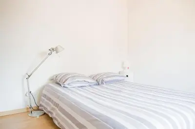 Un ou plusieurs lits dans un hébergement de l'établissement Belle villa-patio à 700m de l'océan