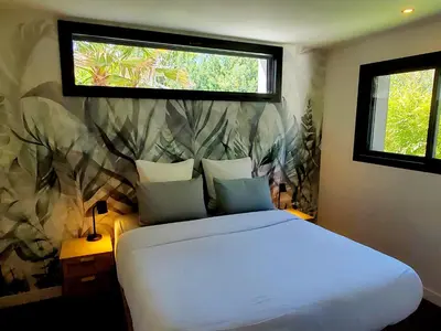 Un ou plusieurs lits dans un hébergement de l'établissement Luxury Bali Villa in Hossegor 5 stars- Pool & Petanque