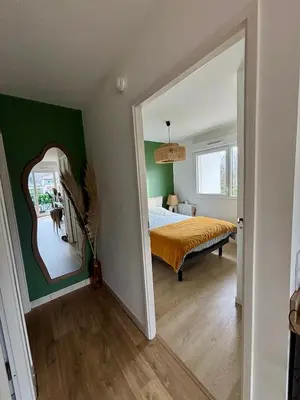 Un ou plusieurs lits dans un hébergement de l'établissement Charmant appartement proche de hossegor et des plages