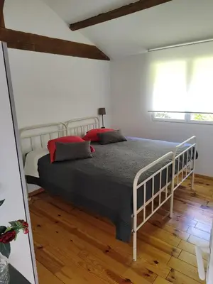 Un ou plusieurs lits dans un hébergement de l'établissement Magnifique grange de 90 m2