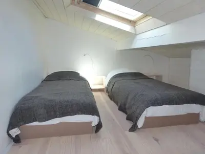 Un ou plusieurs lits dans un hébergement de l'établissement APPARTEMENT COEUR DE LA STATION