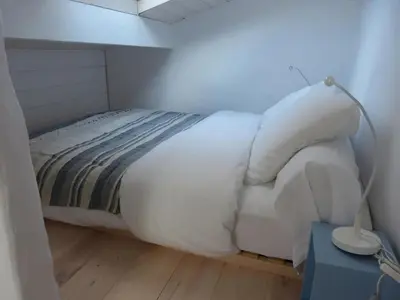 Un ou plusieurs lits dans un hébergement de l'établissement APPARTEMENT COEUR DE LA STATION