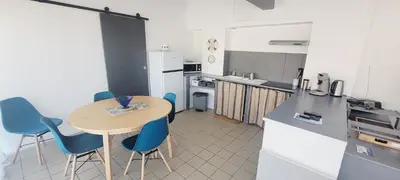 Cuisine ou kitchenette dans l'établissement Le Rayon de Soleil