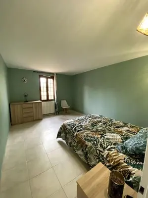 Un ou plusieurs lits dans un hébergement de l'établissement La maison du Haou