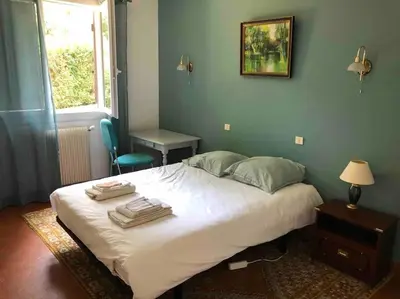 Un ou plusieurs lits dans un hébergement de l'établissement Villa landaise proche lac d’Hossegor et océan