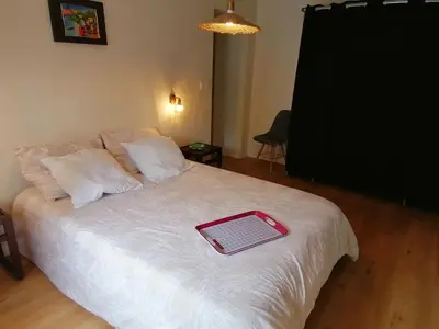 Un ou plusieurs lits dans un hébergement de l'établissement Gite avec vue foret - piscine partagée