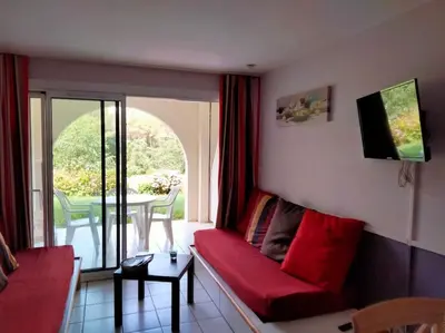 Coin salon dans l'établissement Appart 4 à 5 Pers face au golf 700m de l'océan