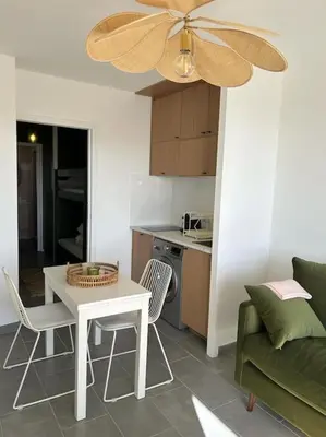 Cuisine ou kitchenette dans l'établissement Studio vue mer