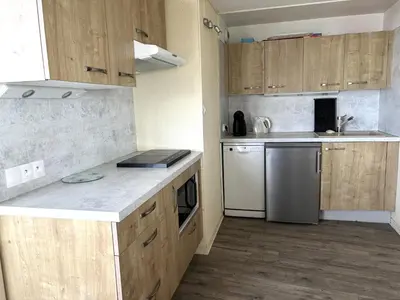 Cuisine ou kitchenette dans l'établissement Le Sunset