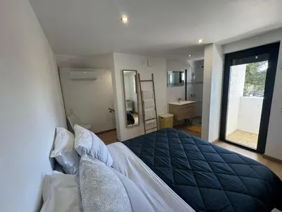 Un ou plusieurs lits dans un hébergement de l'établissement villa bord de mer 400 M de la plage