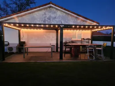 Terrasse ou espace extérieur de l'établissement maison du bonheur